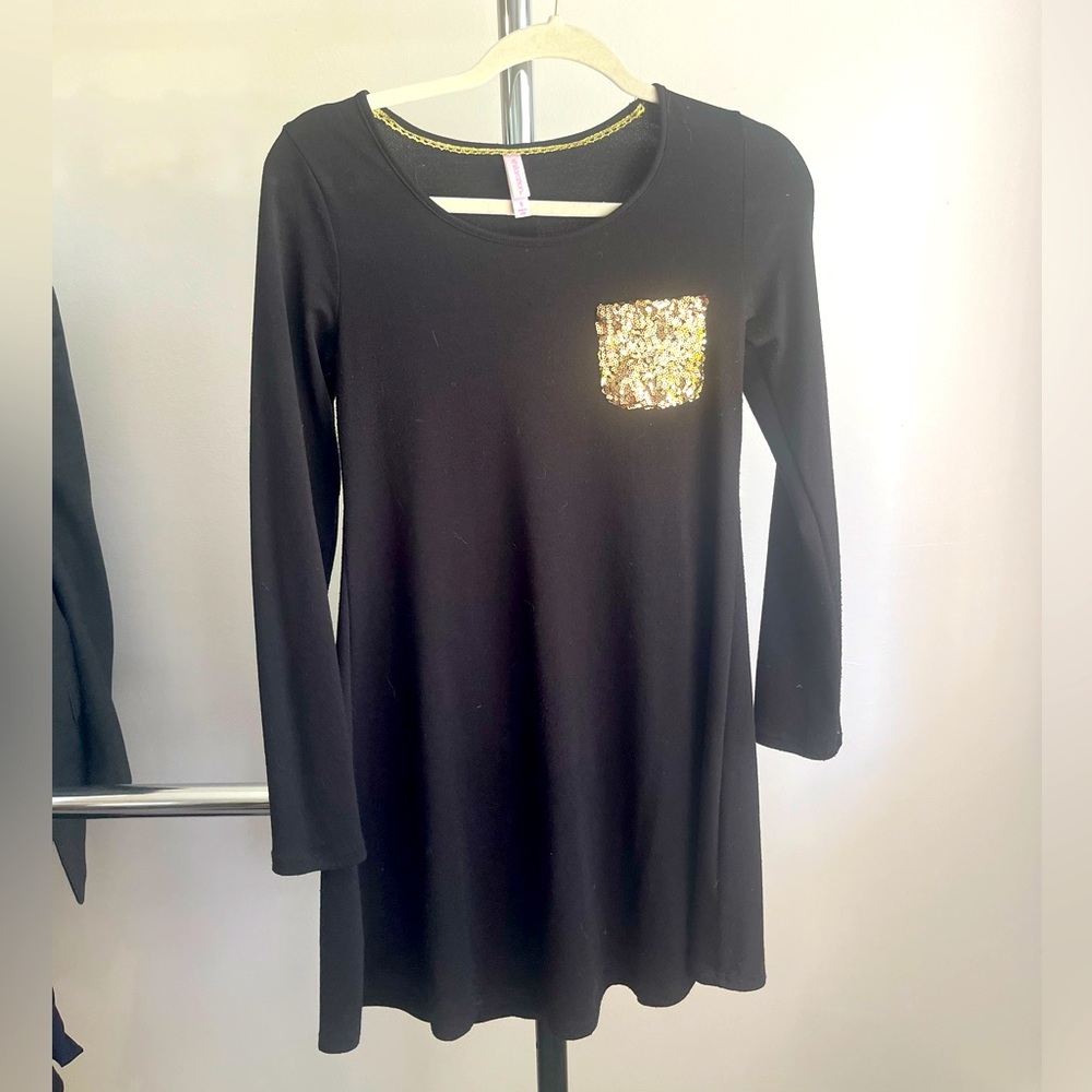 Black dress with gold glitter pocket